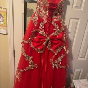 Elegant Red Backless Dress with Gold Accents